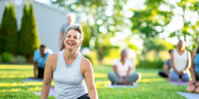 People practicing laughing yoga