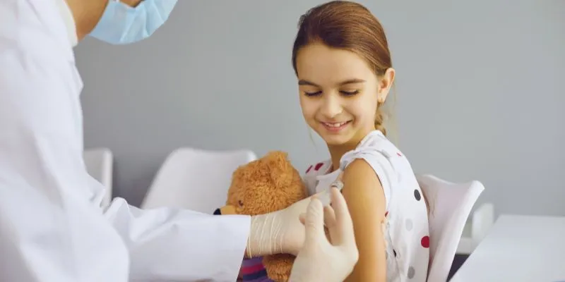 Happy child after receiving a flu shot