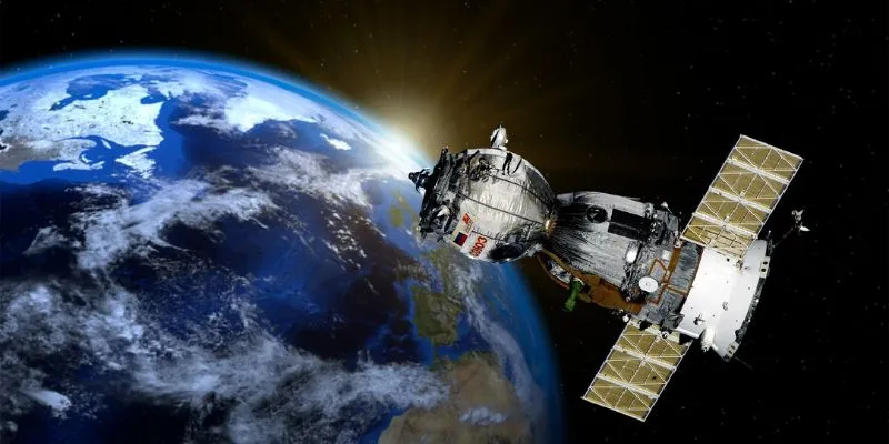 Remote sensing illustration showing satellite collecting data from
Earth.