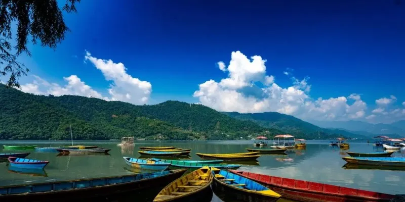 Phewa Lake in Pokhara reflecting the Annapurna Range