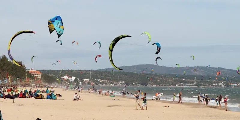 Kiteboarders enjoying the wind in Mui
Ne