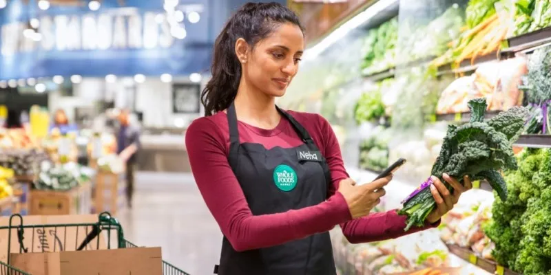 Customer using the Whole Foods app on a smartphone