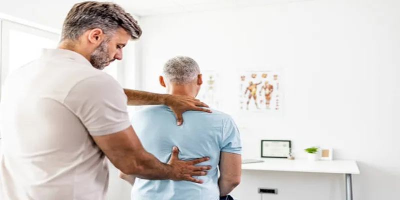 Chiropractor performing spinal
adjustment