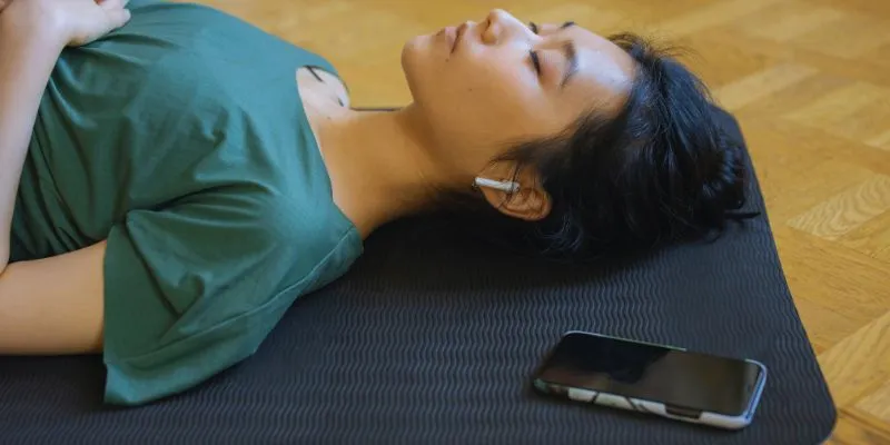 Person practicing Yoga
Nidra