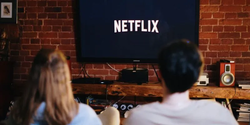 Person exercising while watching TV