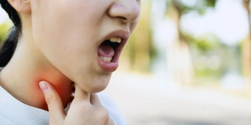 Doctor examining vocal
cords